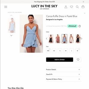 Lucy in the Sky light blue wrap-dress. Size medium. Only worn once.